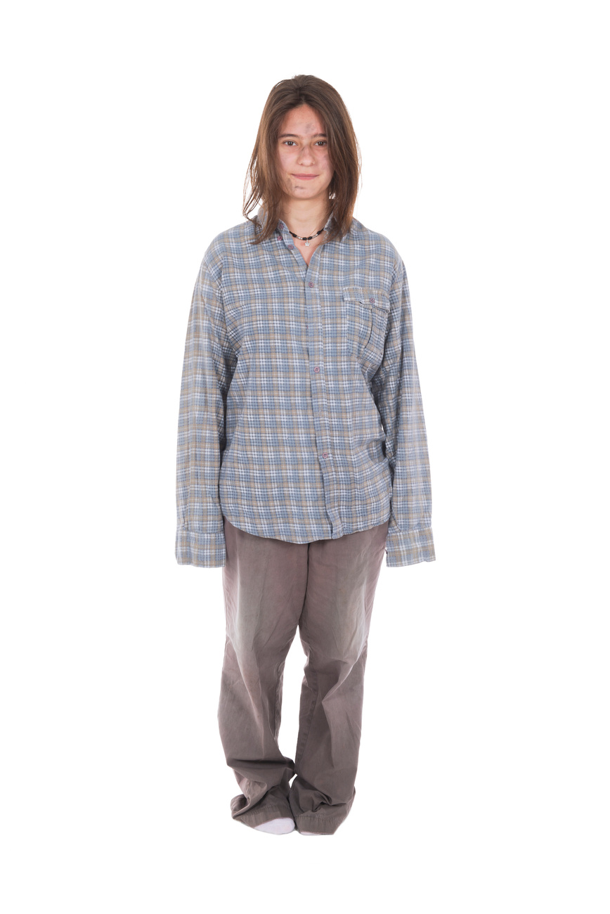 Young homeless dressed in loose clothing